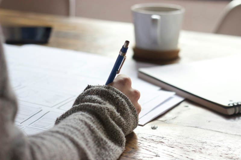 Notes and planning materials on a desk